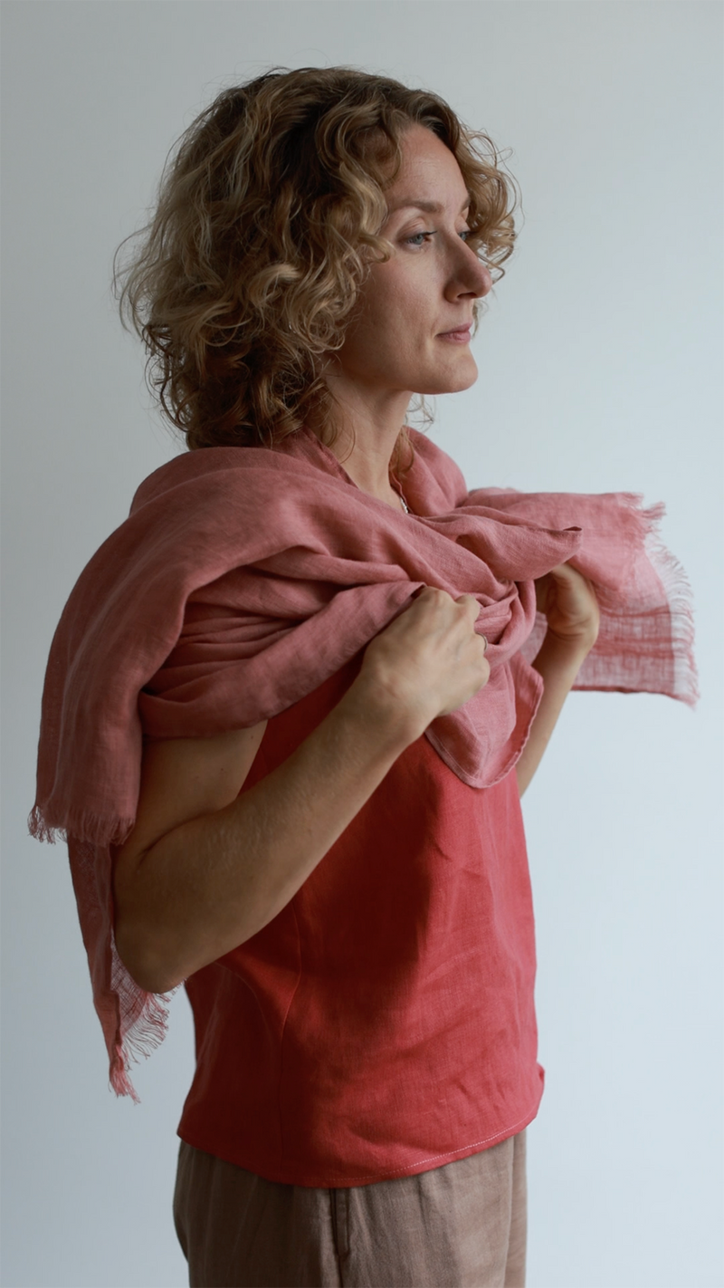woman in rose Linen scarf and red t-shirt