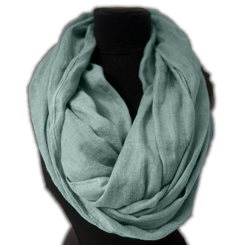 Infinity scarf petole blue on clothing black mannequin