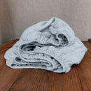 Linen fitted sheet ice blue on wooden box 6