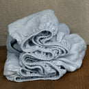 Linen fitted sheet ice blue on wooden box 8