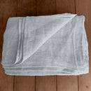 Linen flat sheet ice blue on wooden box