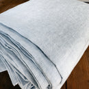 Linen flat sheet ice blue on wooden box 2