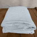 Linen flat sheet ice blue on wooden box 3