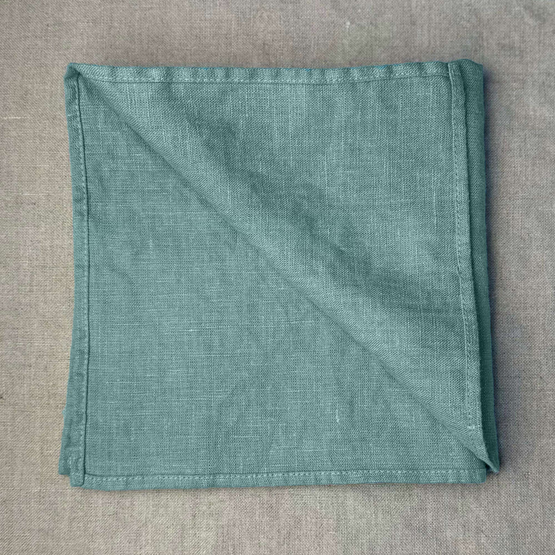 Linen-napkin-turquoise-square-curved-end