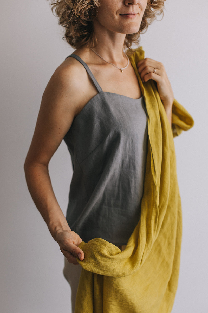 woman in citrine yellow Linen scarf and gray t-shirt