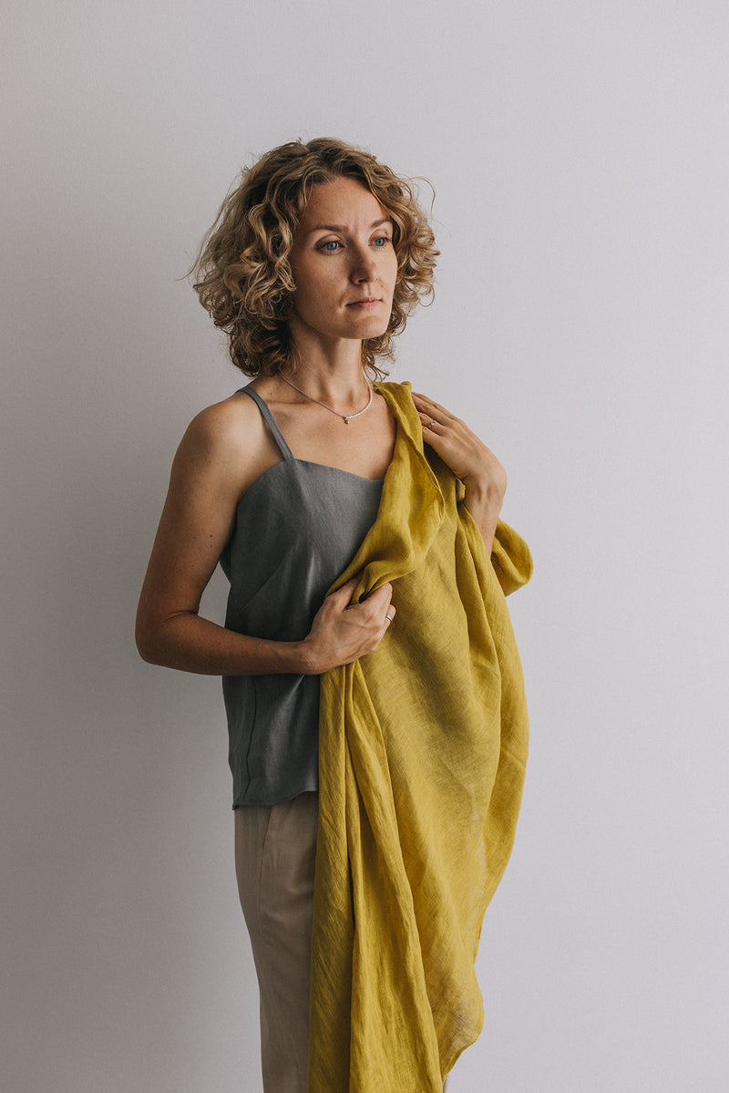 woman in citrine yellow Linen scarf and gray t-shirt