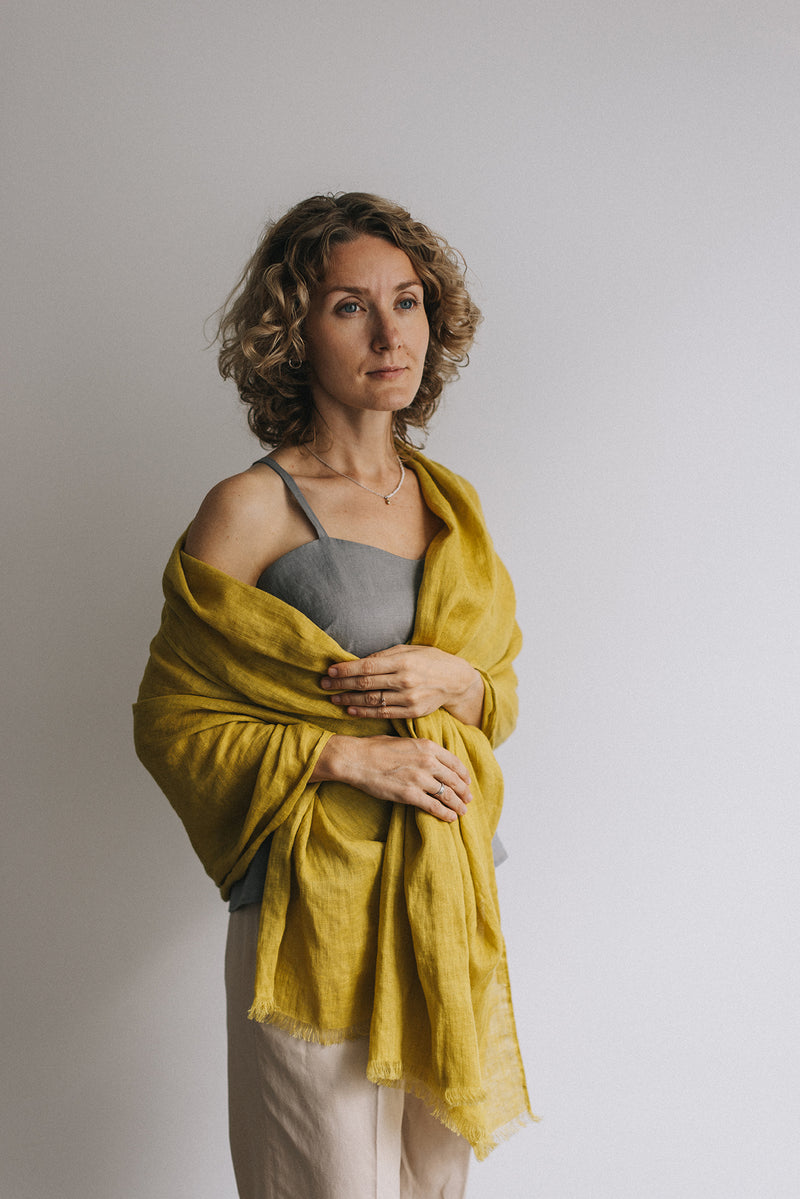 woman in citrine yellow Linen scarf and gray t-shirt