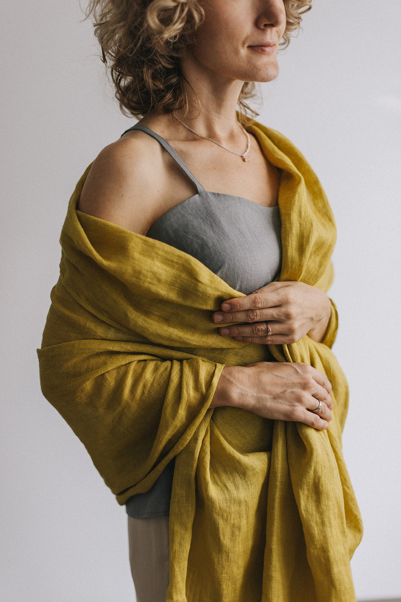 woman in citrine yellow Linen scarf and gray t-shirt