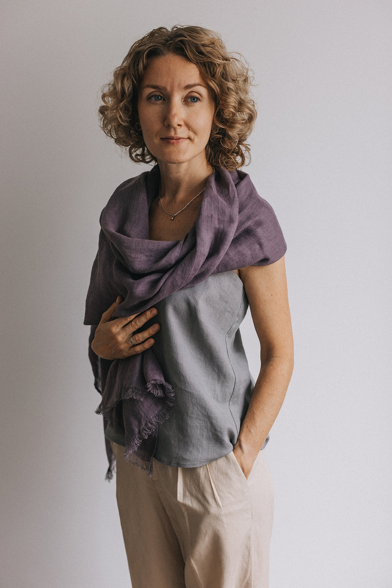 woman in aubergine violet Linen scarf and gray t-shirt