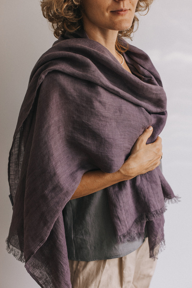 woman in aubergine violet Linen scarf and gray t-shirt
