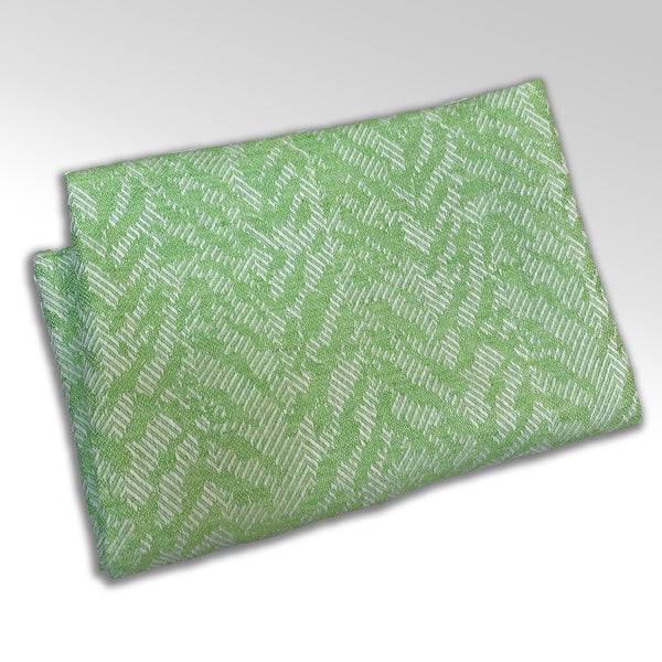 Piece-of-green-fabric-linen-cotton-with-abstract-pattern